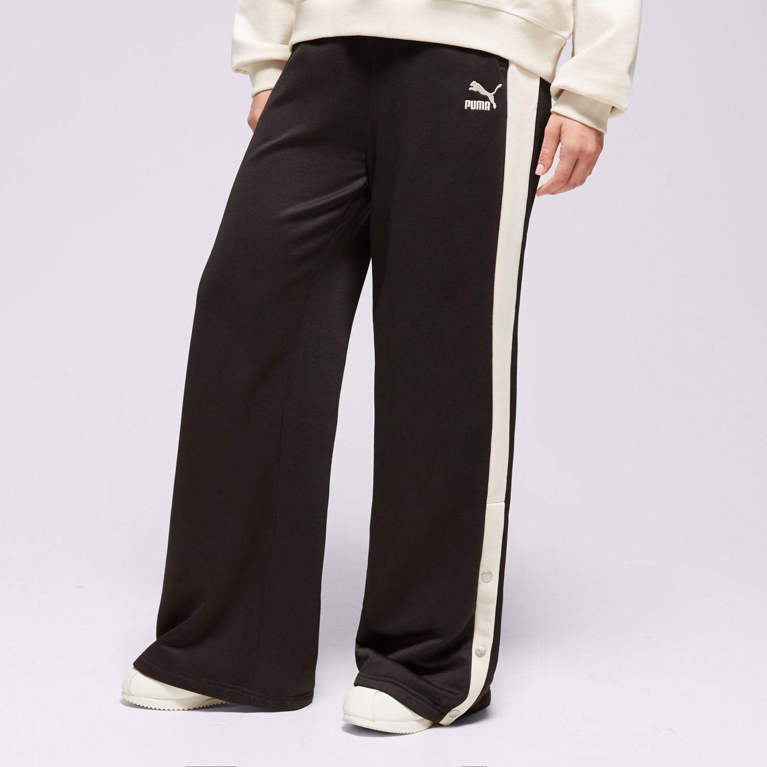Femei pantaloni PUMA PANTALONI  RELAXED TRACK 62502501 Negru
