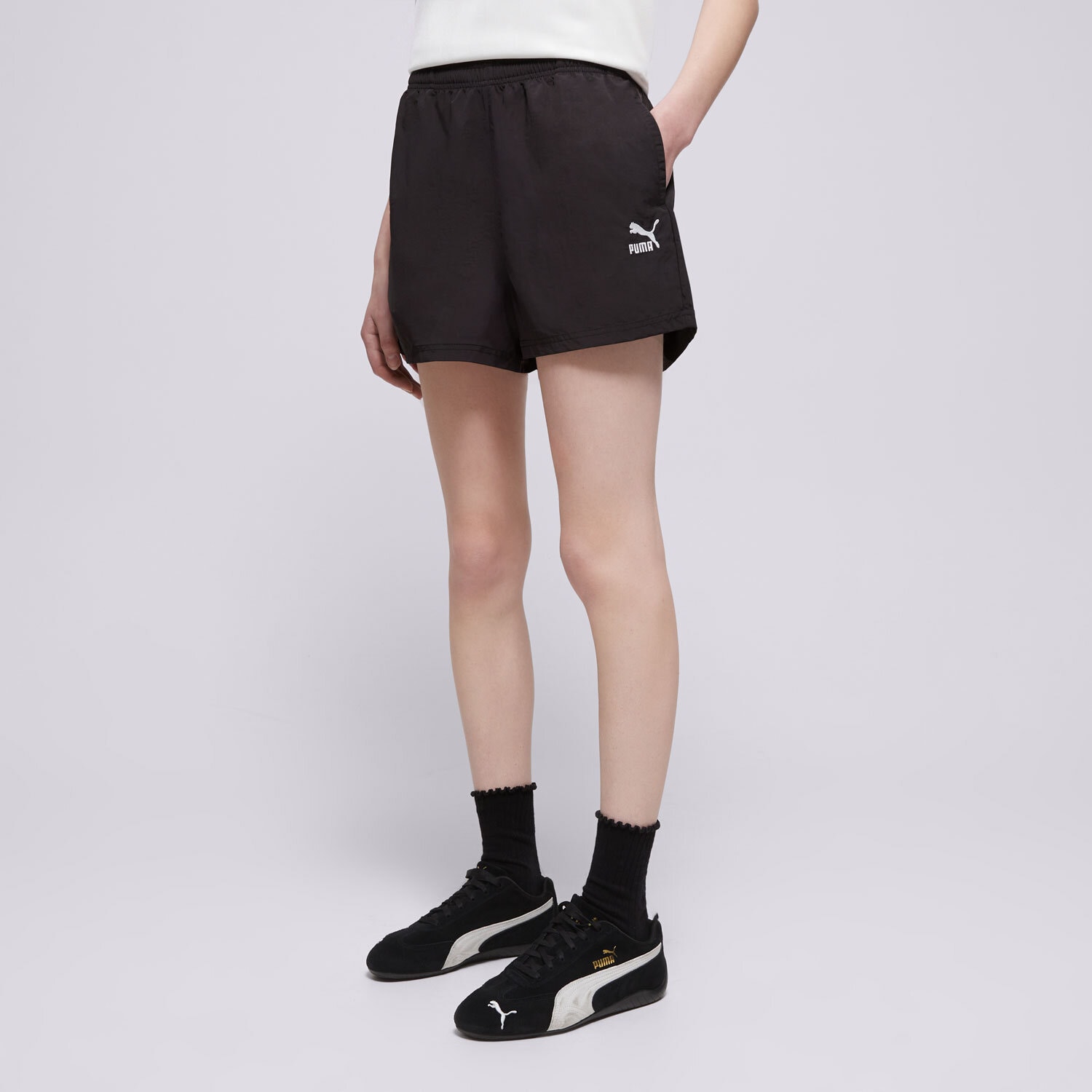 Femei pantaloni scurți PUMA PANTALONI SCURȚI CLASSICS A-LINE 62424201 Negru