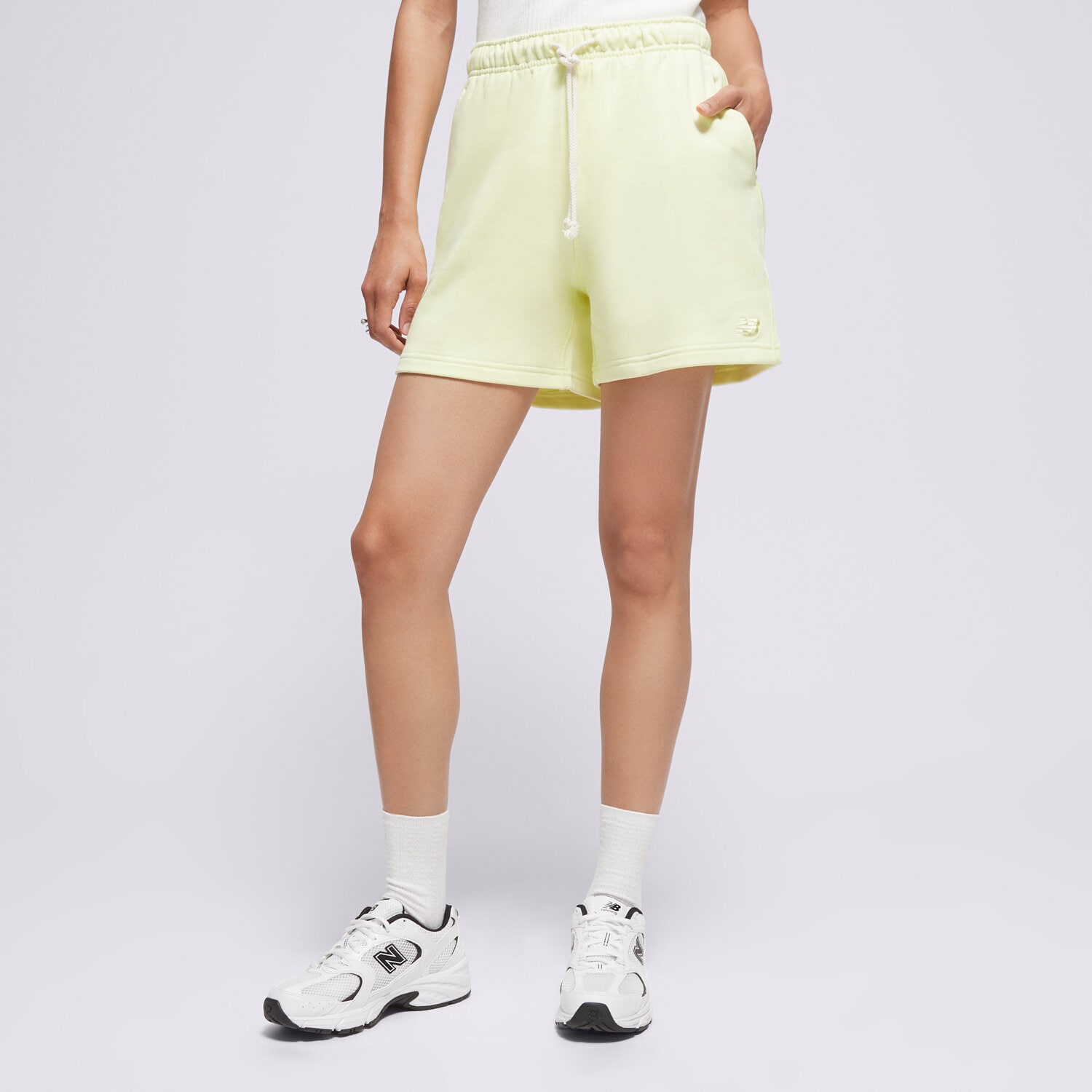 Femei pantaloni scurți NEW BALANCE PANTALONI SCURȚI   ATHLETICS FRENCH TERRY WS41508LLT Galben