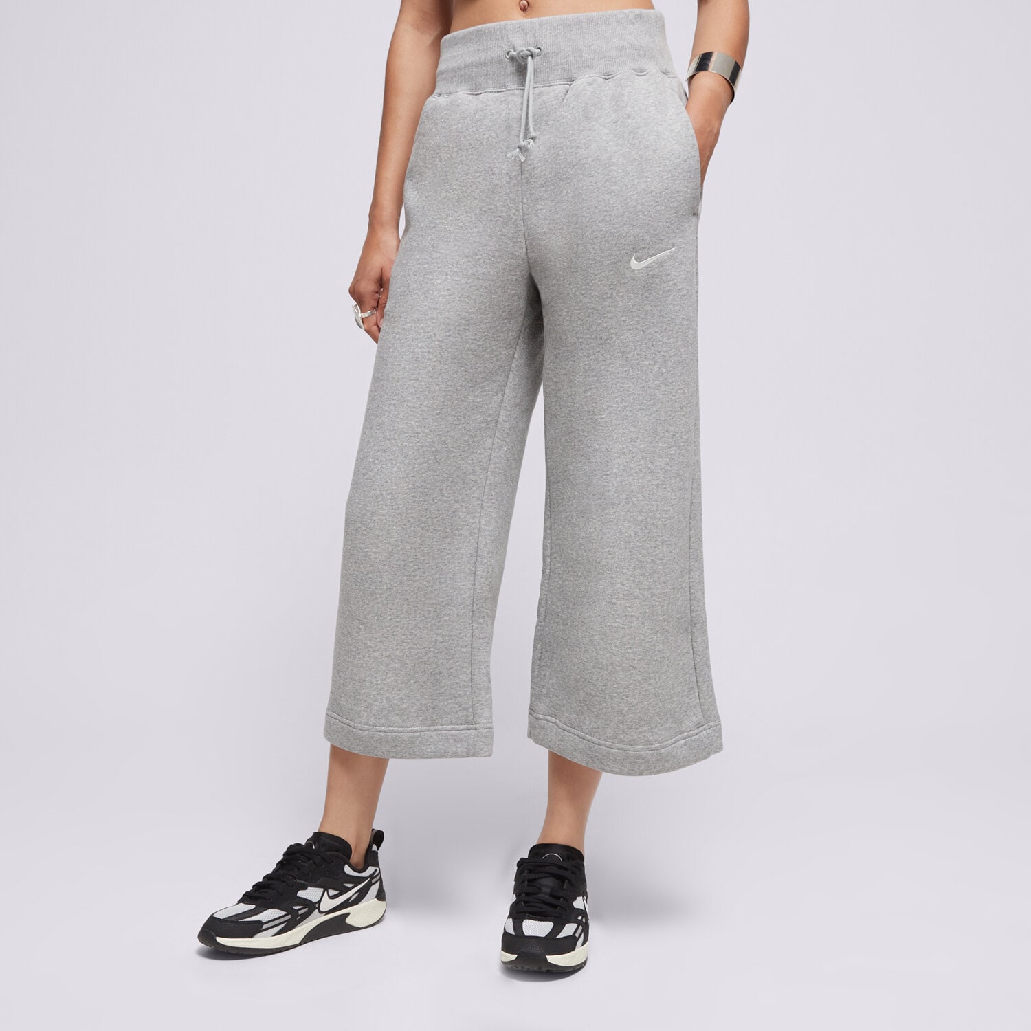 Femei pantaloni NIKE PANTALONI  W NSW PHNX FLC HR CROP SWTP FB8313-063 Gri