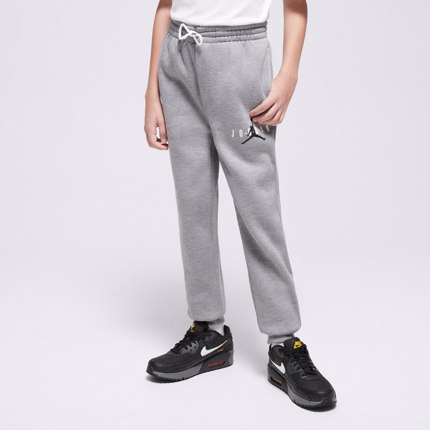 Pantaloni pentru copii JORDAN PANTALONI  JDB JUMPMAN SUSTAINABLE PANT BOY 95B912-GEH Gri