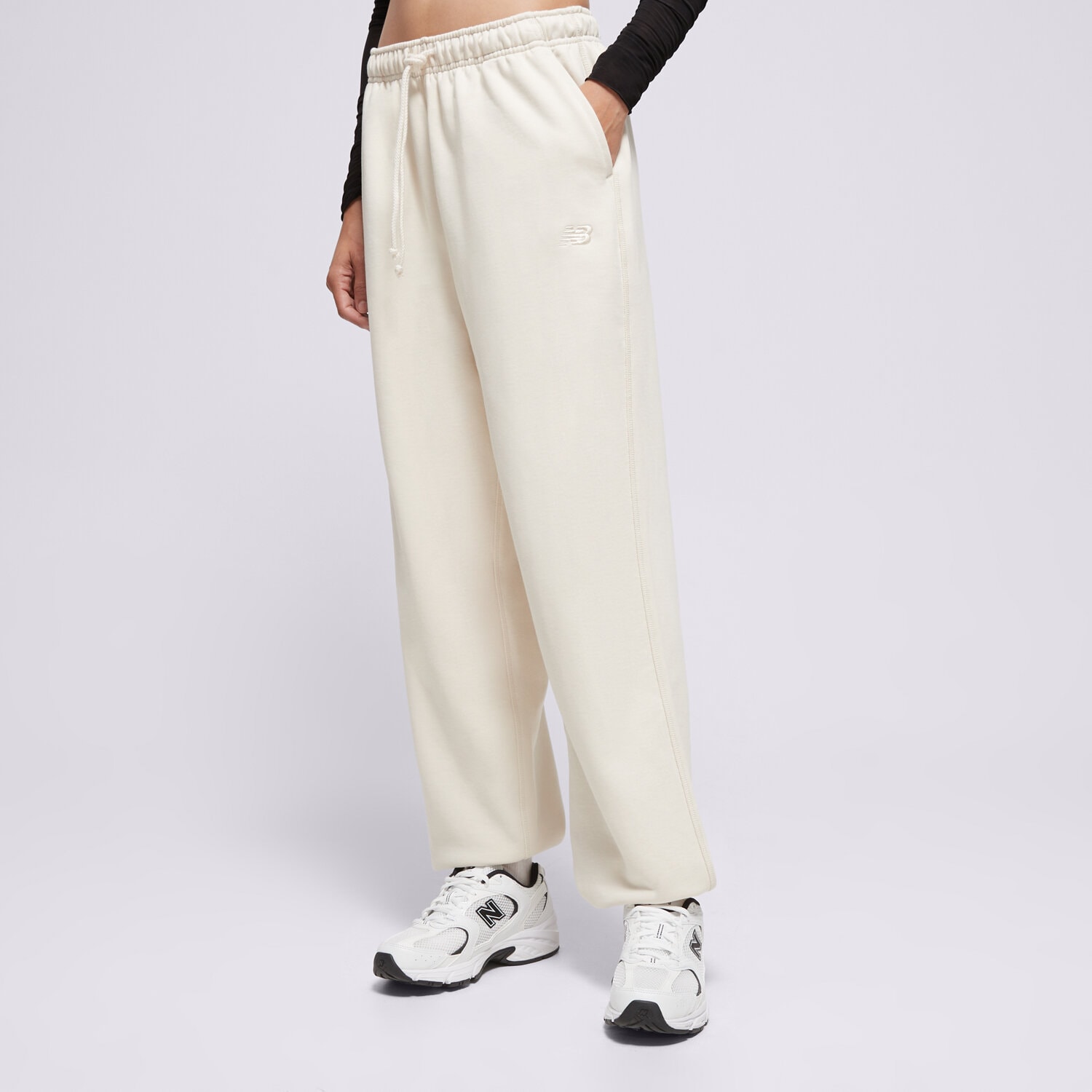 Femei pantaloni NEW BALANCE PANTALONI  ATHLETICS   FRENCH TERRY JOGGER WP41513LIN Bej