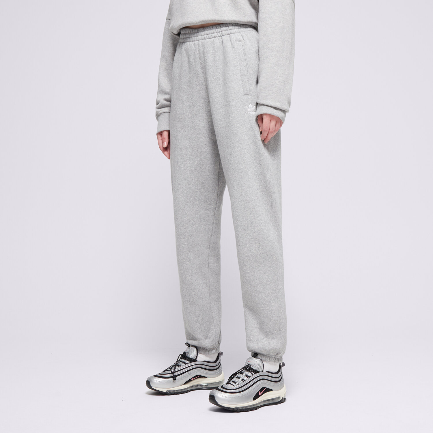 Femei pantaloni ADIDAS PANTALONI  ESS JOGGERS IY9638 Gri