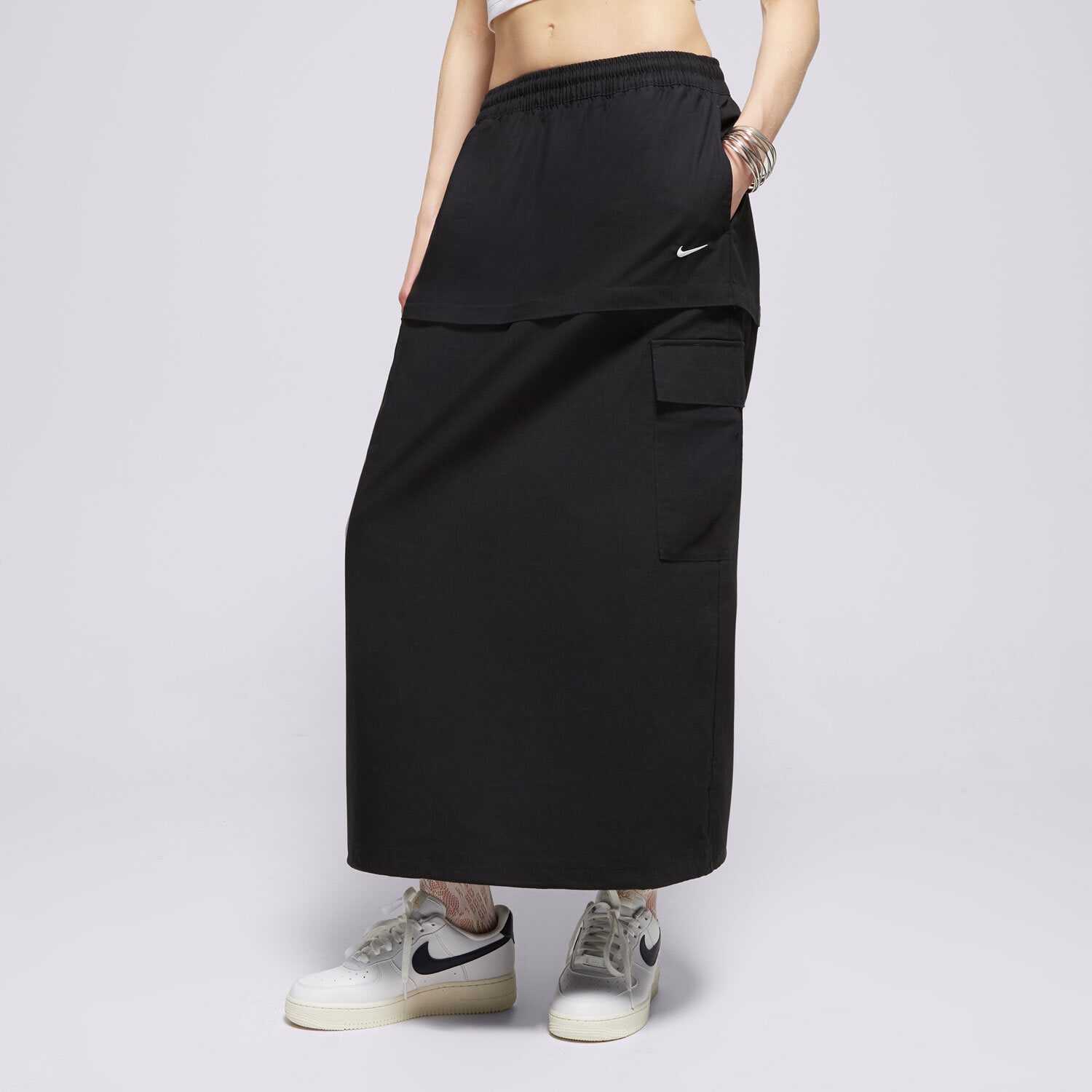 Femei rochii și fuste NIKE FUSTĂ W NSW ESSTL WVN MR CGO MDI SKT FV7503-010 Negru