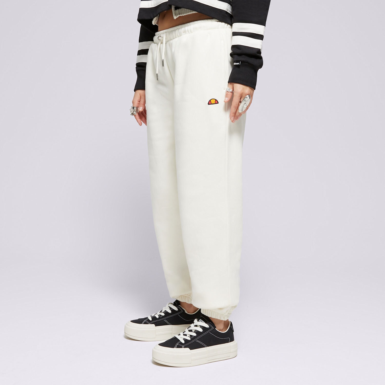 Femei pantaloni ELLESSE PANTALONI  MUGIA JOG PANT OFF WHT SMG22040904 Bej