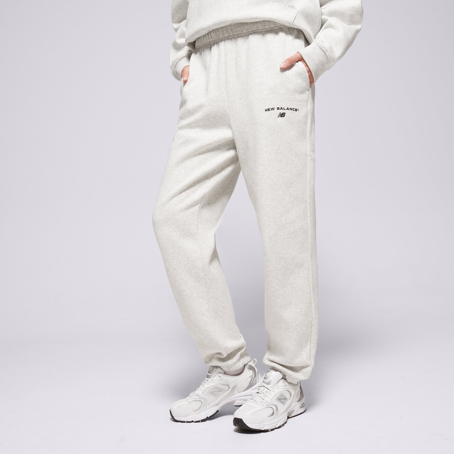 Femei pantaloni NEW BALANCE PANTALONI  REIMAGINED JOGGER WP51500AHH Gri