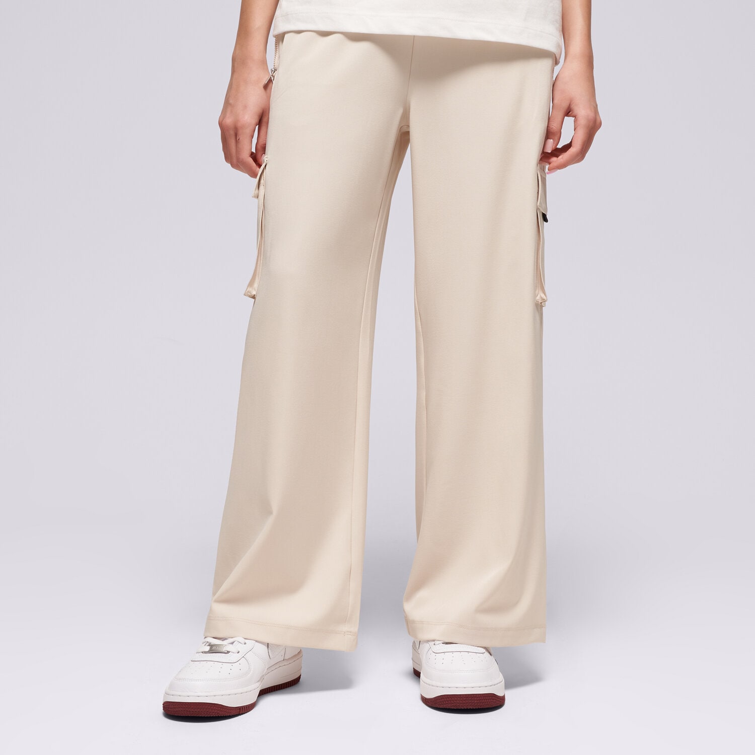 Pantaloni pentru copii JORDAN PANTALONI  JUMPMAN POST UP OPEN CARGO GIRL 45F202-XAE cremă
