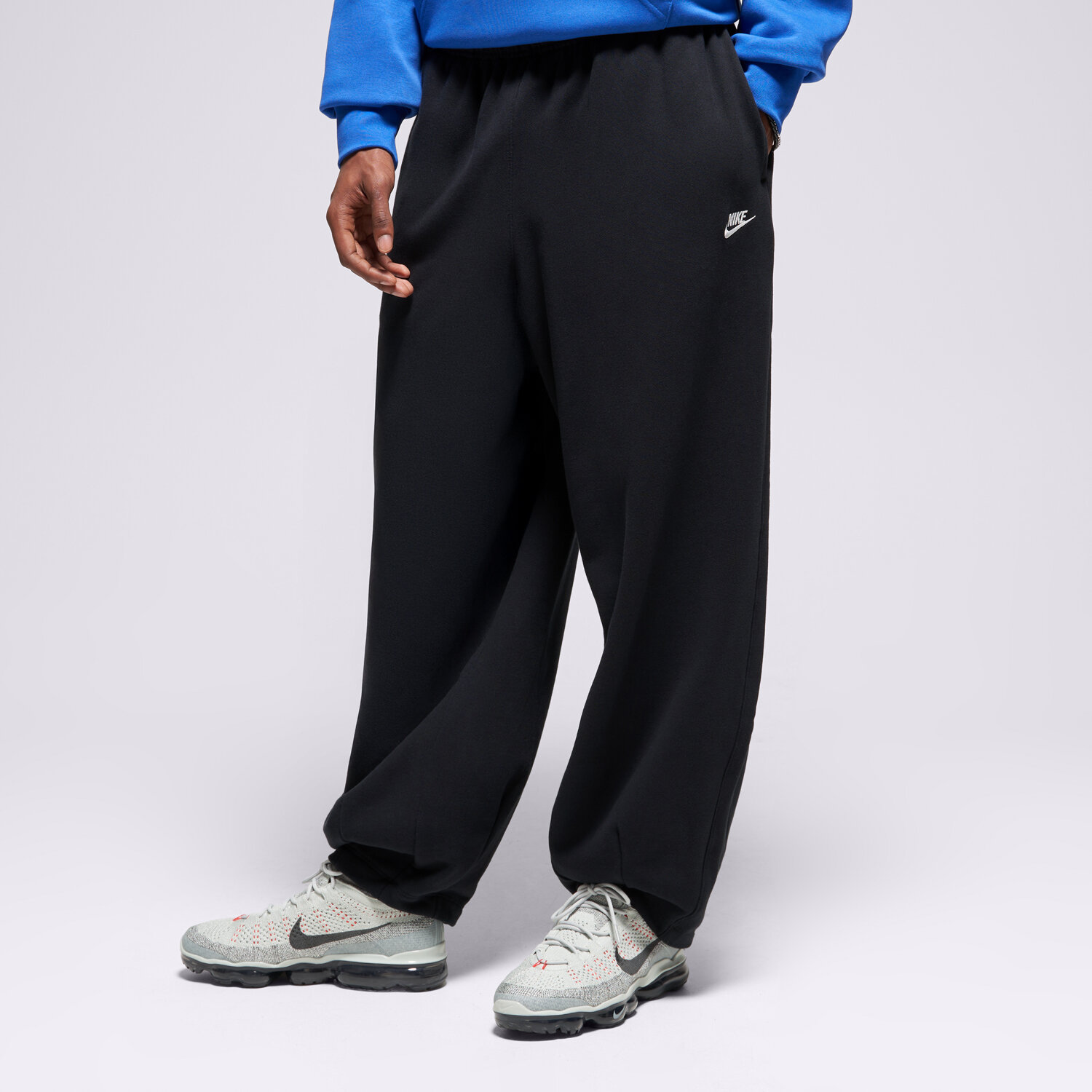 Bărbați pantaloni NIKE PANTALONI  M NK CLUB FT OVERSIZED PANT HJ1822-010 Negru