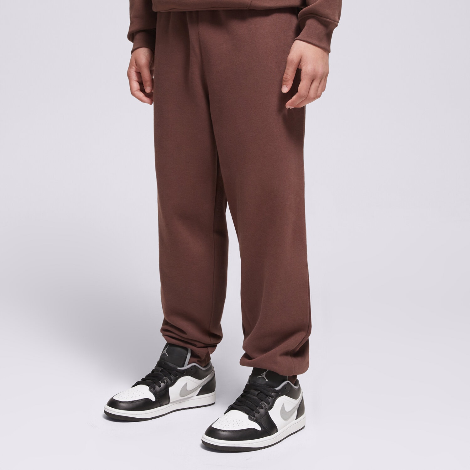 Pantaloni pentru copii JORDAN PANTALONI  MJ BRKLN FLC PANT BOY 95F113-X25 Maro