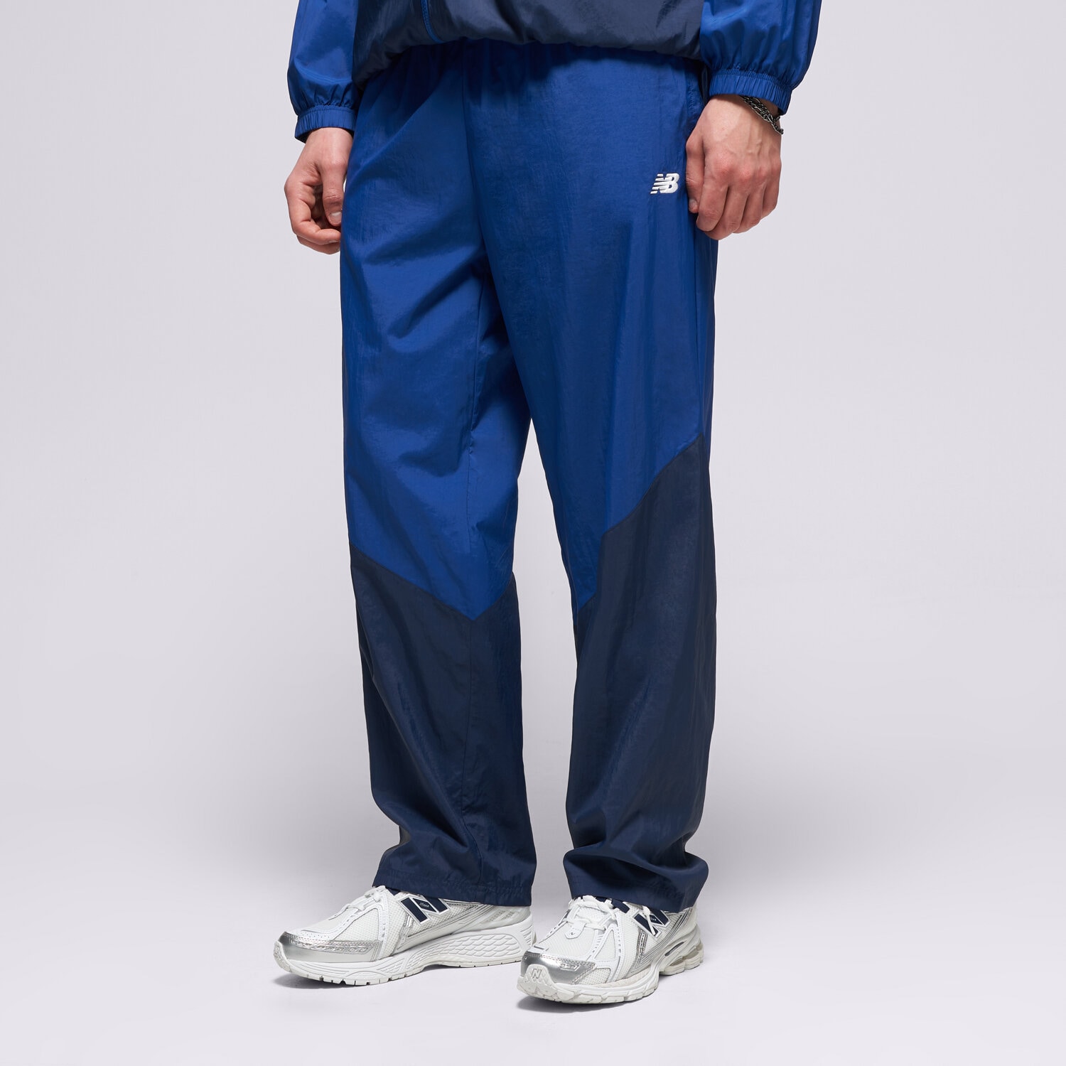 Bărbați pantaloni NEW BALANCE PANTALONI  SPORT LEGACY PANT MB61R010NNY Bleumarin