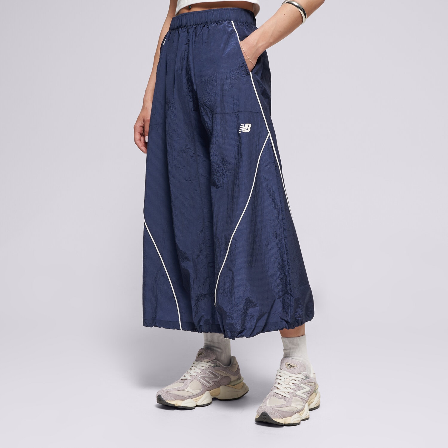 Femei rochii și fuste NEW BALANCE FUSTĂ SPORT LEGACY SKIRT WB61D2OPNNY Bleumarin