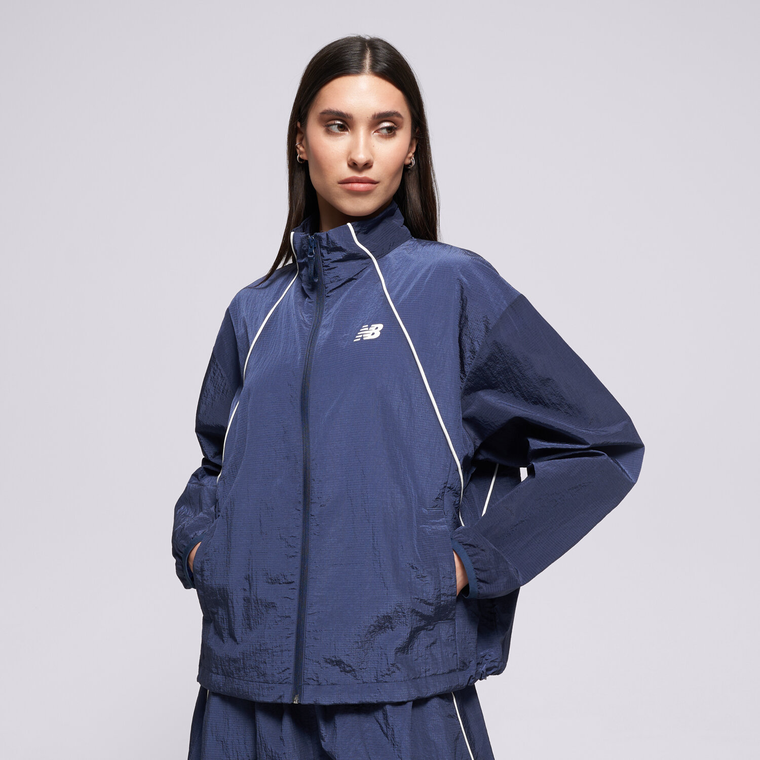 Femei jachetă NEW BALANCE JACHETĂ SPORT LEGACY JACKET WJ6113KSNNY Bleumarin