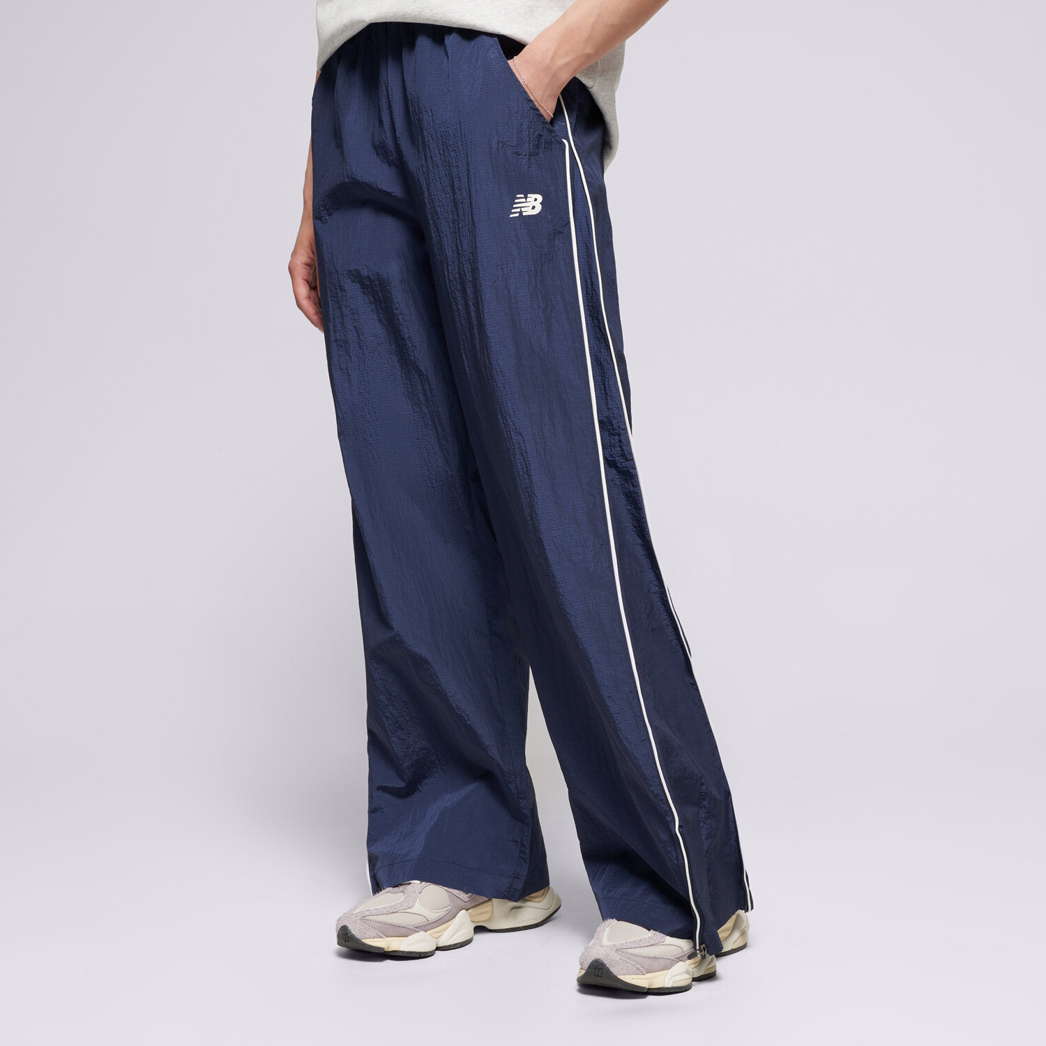 Femei pantaloni NEW BALANCE PANTALONI  SPORT LEGACY PANT WB61Z1E6NNY Bleumarin