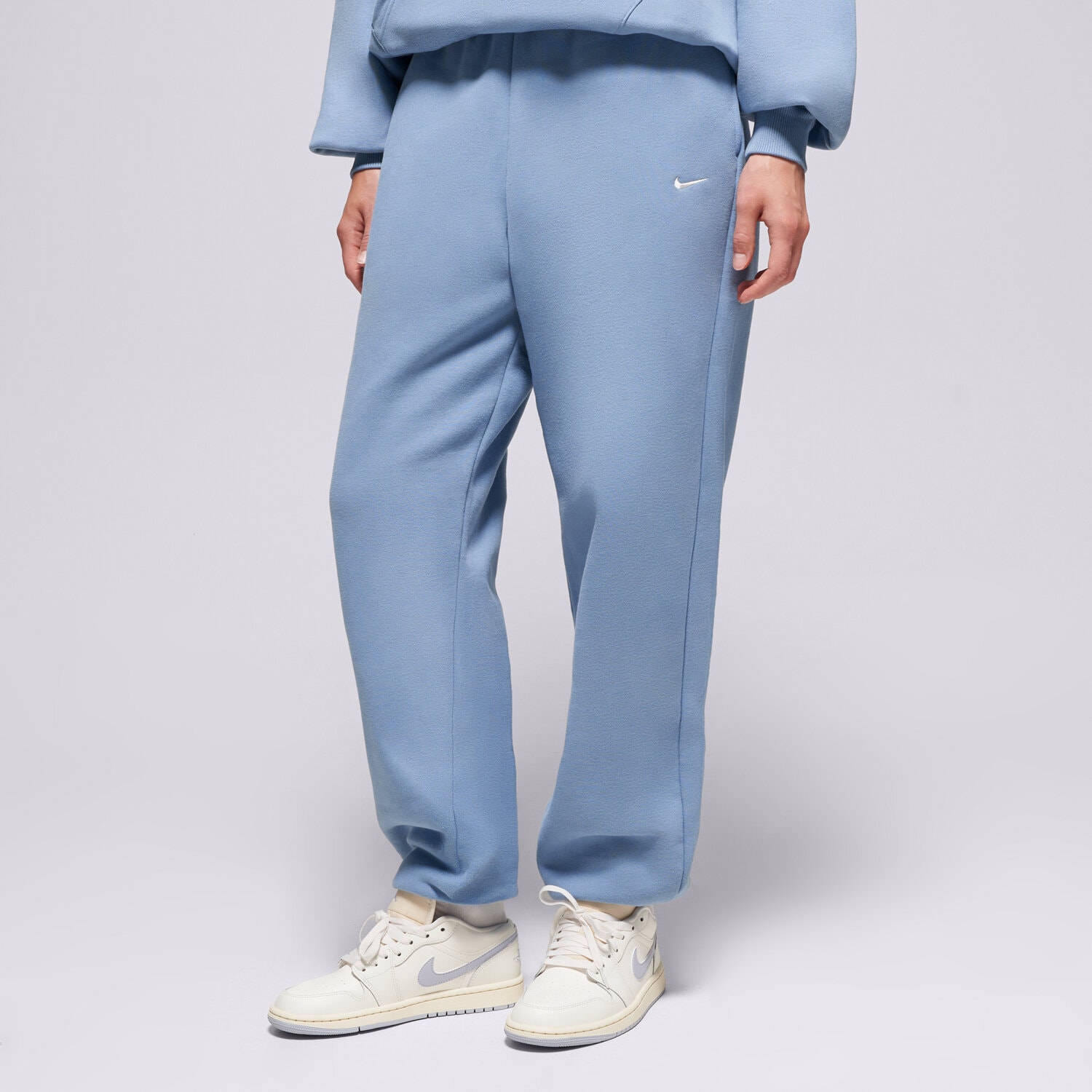 Femei pantaloni NIKE PANTALONI  W NK STDO FLC OS CFF PNT IM8074-486 Albastru