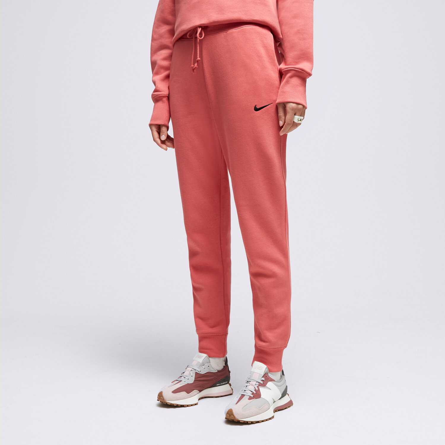 Femei pantaloni NIKE PANTALONI  MIDI SWSH JOG ADOBE PANTS FD0893-655 Roz