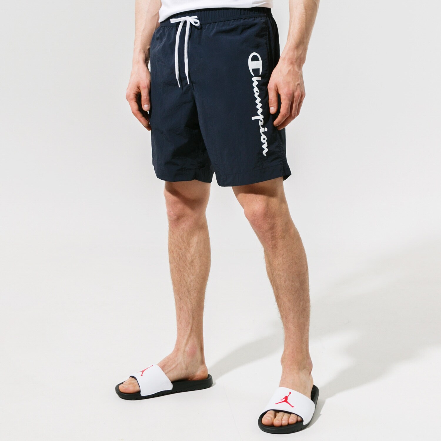 Femei pantaloni scurți CHAMPION PANTALONI SCURȚI BEACHSHORT 216068BS501 Bleumarin