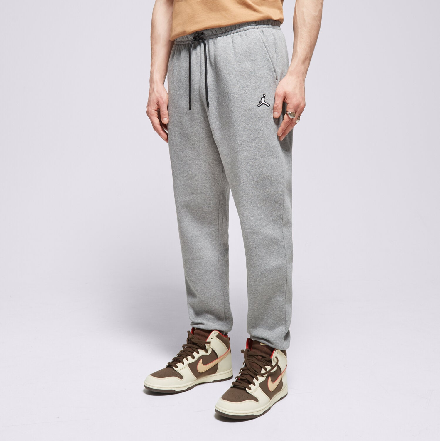 Bărbați pantaloni JORDAN PANTALONI  M J ESS FLC PANT DQ7340-091 Gri