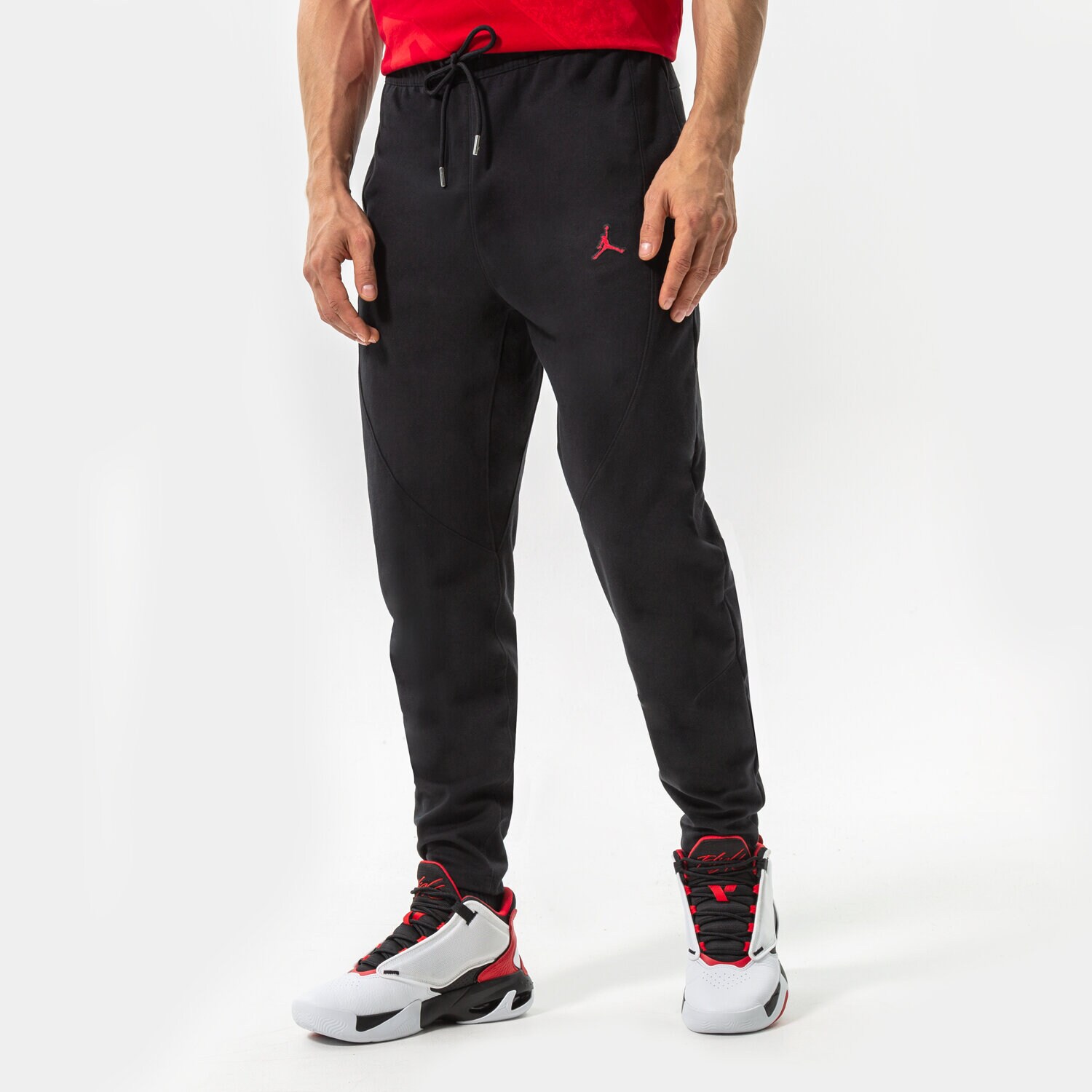 Bărbați pantaloni JORDAN PANTALONI  M J ESS WARMUP PANT DJ0881-010 Negru