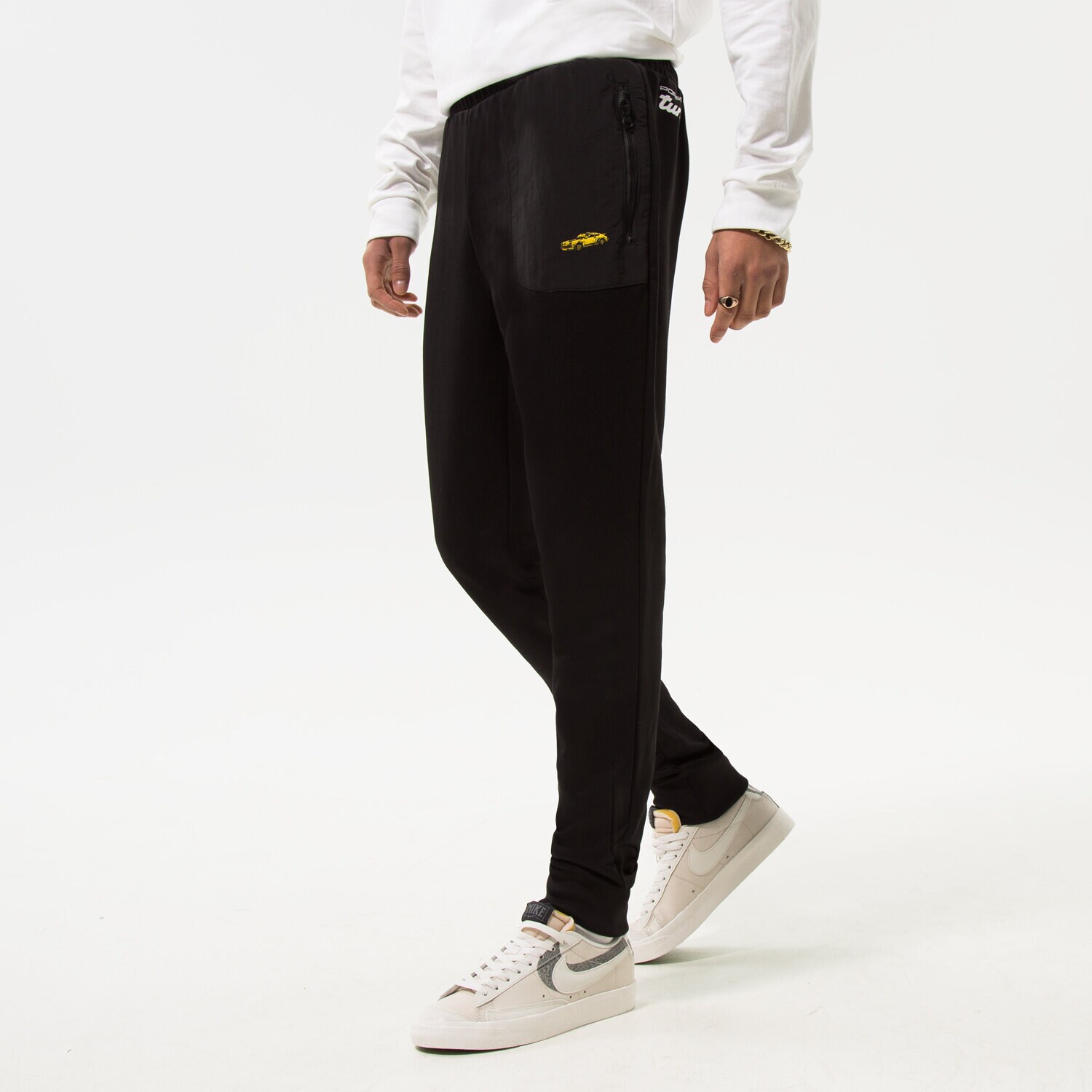 Bărbați pantaloni PUMA PANTALONI  PUMA PL SWEAT PANTS 534828-01 Negru