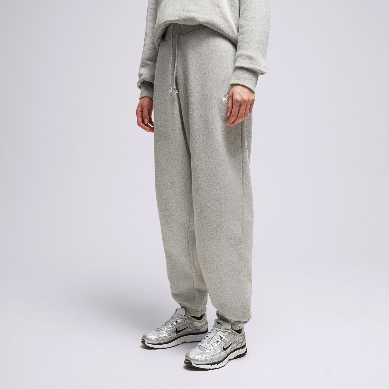 Femei pantaloni NIKE PANTALONI  W NSW PHNX FLC HR OS PANT DQ5887-063 Gri