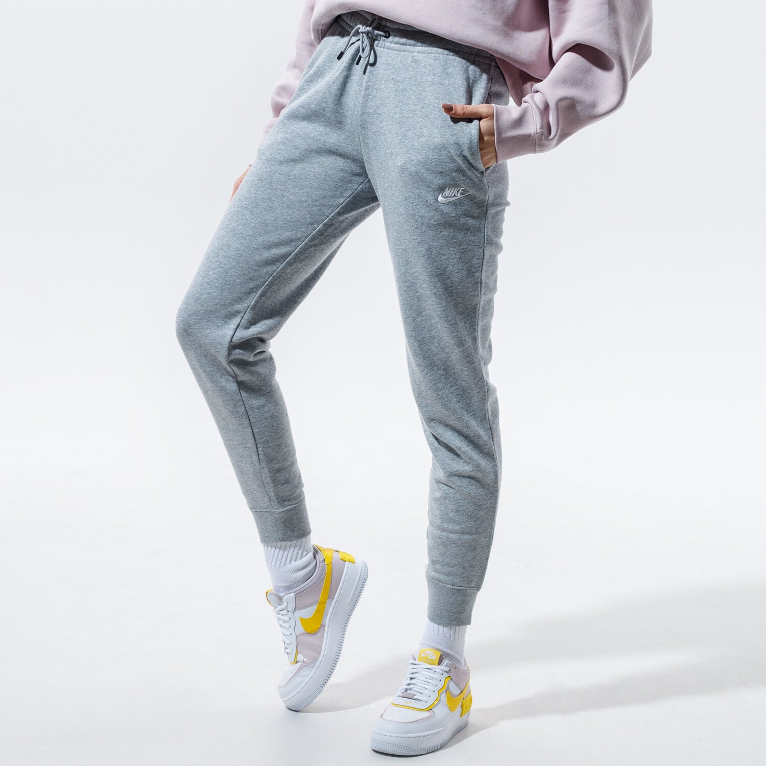 Femei pantaloni NIKE ESSENTIAL JOGGERS BV4095-063 Gri