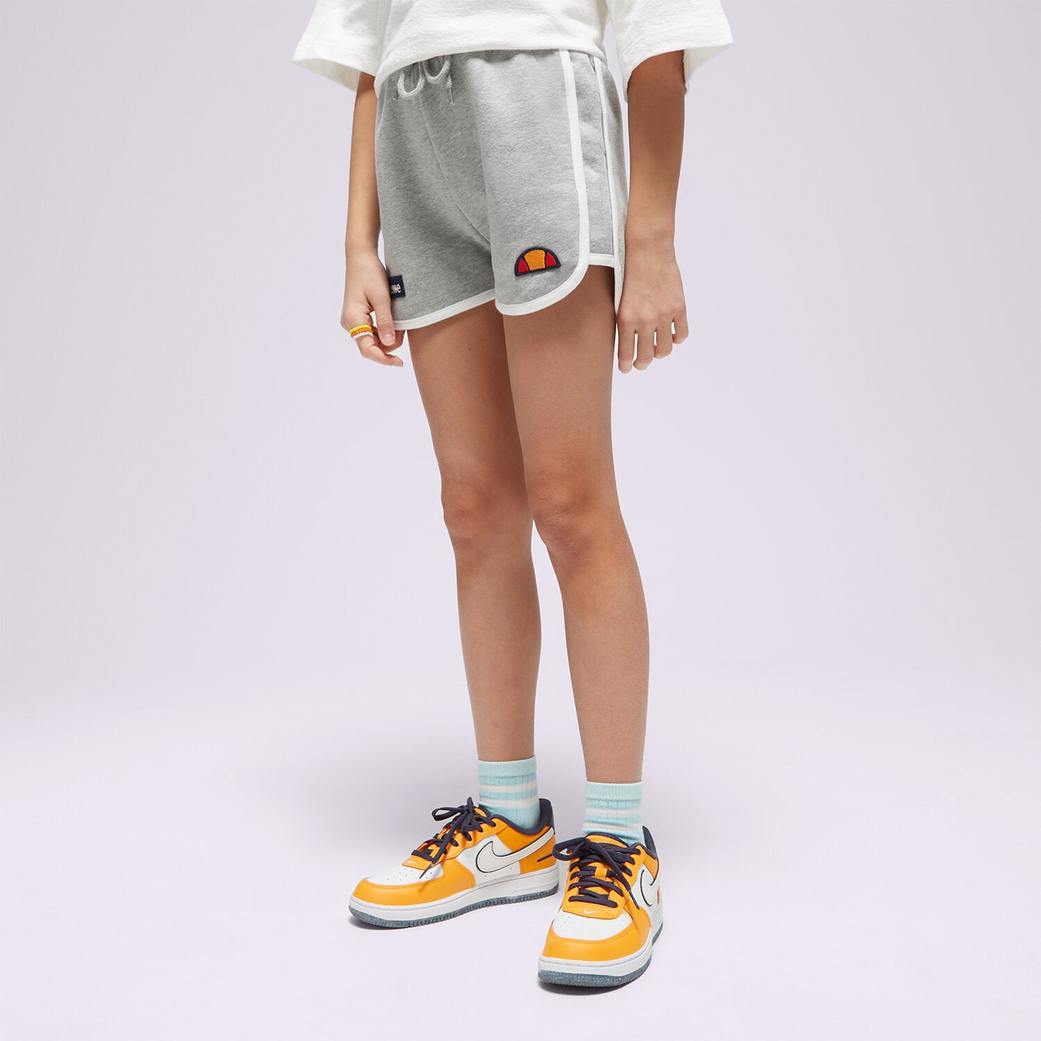 Pantaloni scurți și rochii pentru copii ELLESSE PANTALONI SCURȚI   VICTENA SHORT JNR GREY MRL S4E08601112 Gri