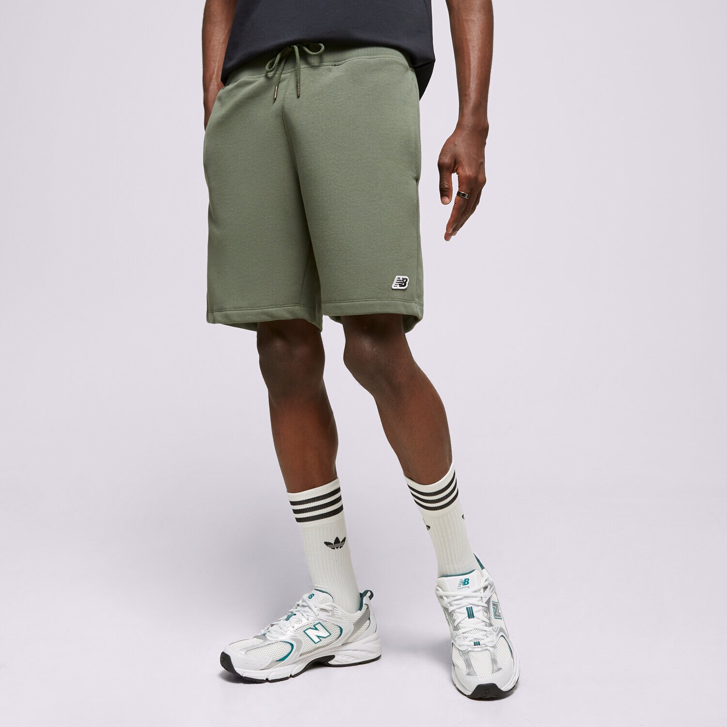 Femei pantaloni scurți NEW BALANCE PANTALONI SCURȚI SSMALL LOGO SHORTS MS23600DON Verde