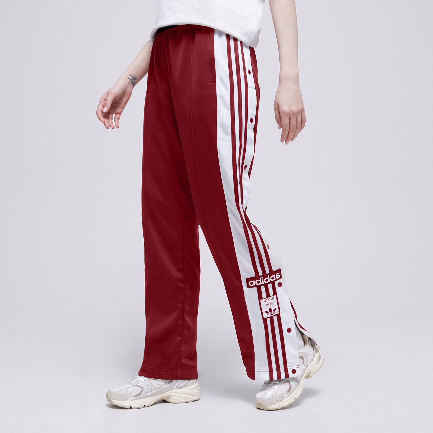 Femei pantaloni ADIDAS PANTALONI ADIBREAK TP IB7297 Roșu
