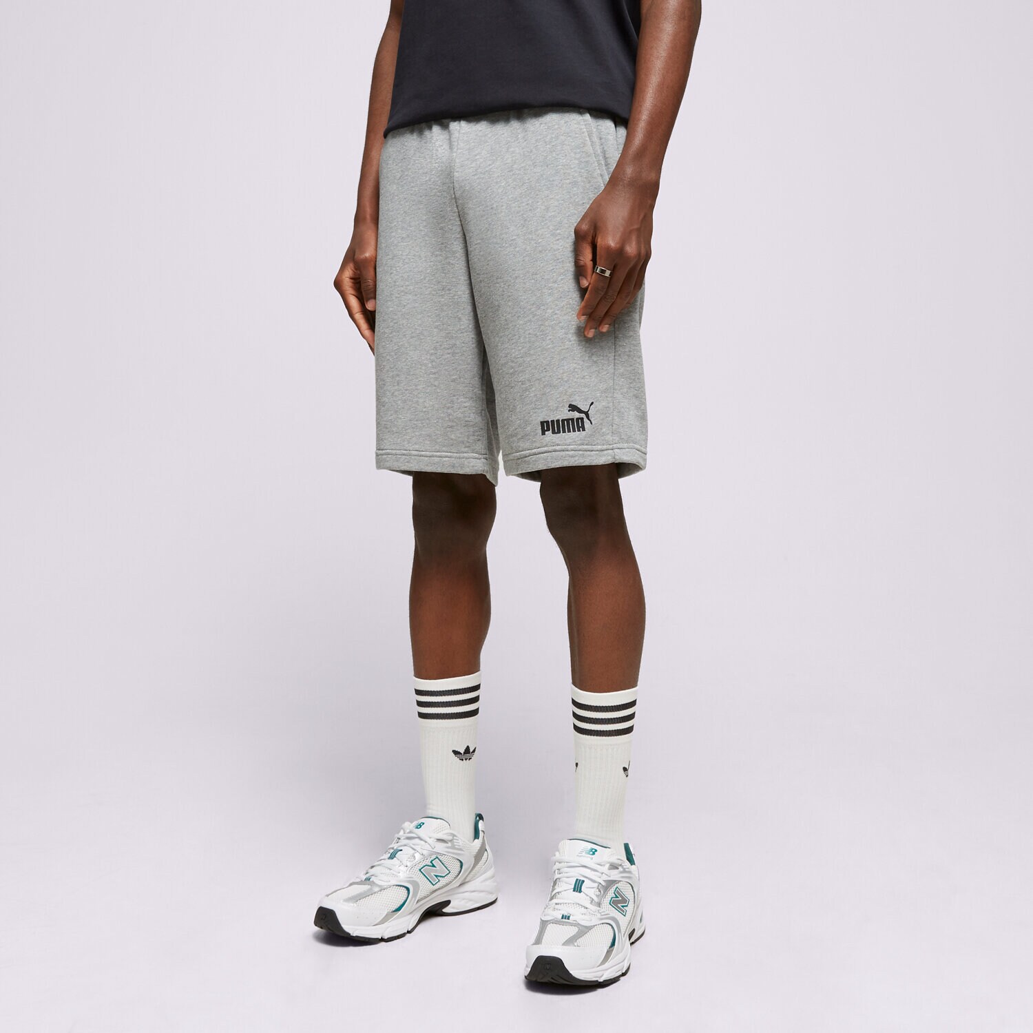 Femei pantaloni scurți PUMA PANTALONI SCURȚI ESS SHORTS 10" 58670903 Gri