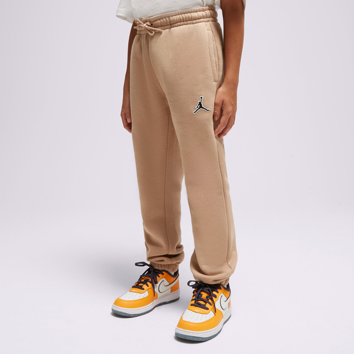 Pantaloni pentru copii JORDAN PANTALONI  ESSENTIALS BOY 95A716-X0L Bej
