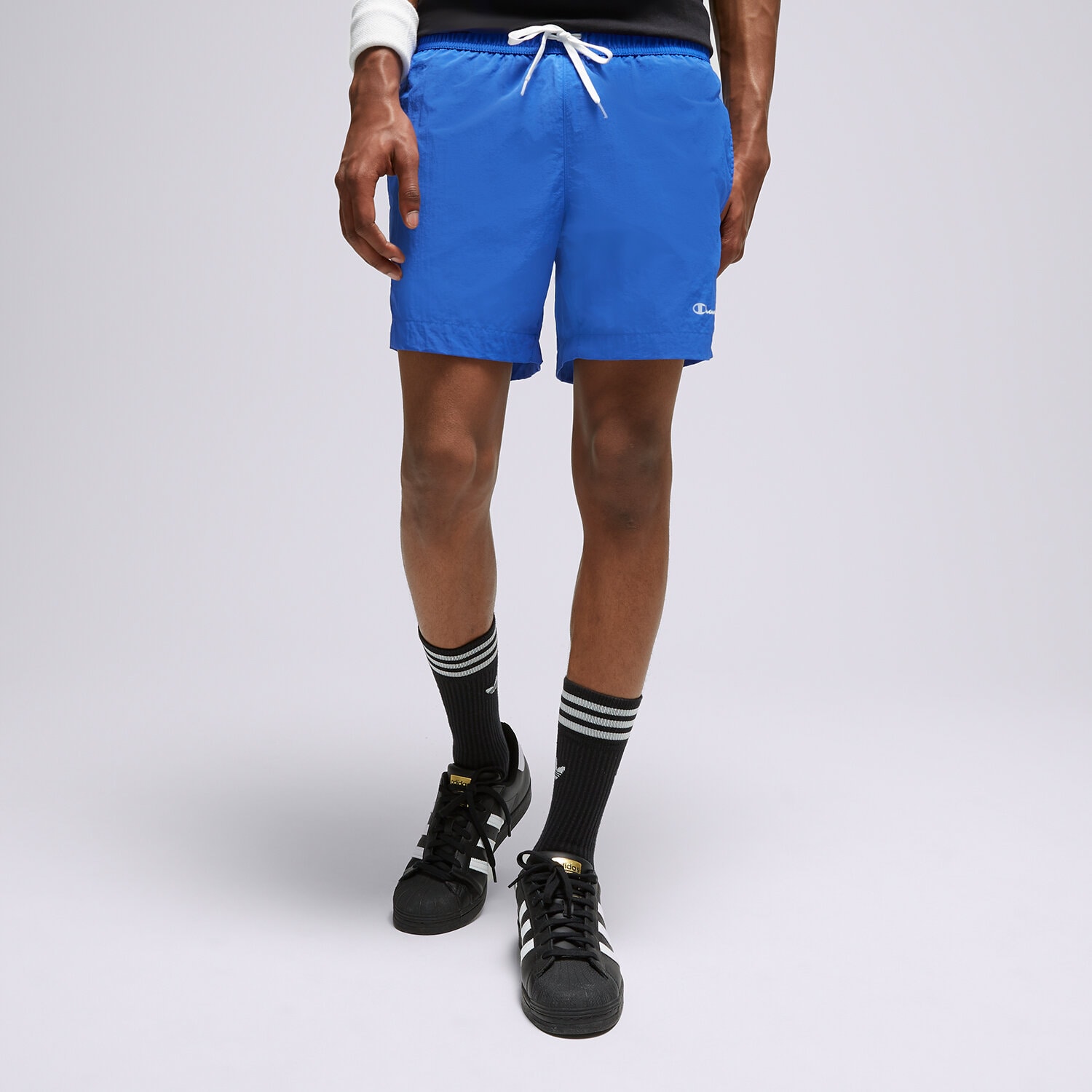 Femei pantaloni scurți CHAMPION PANTALONI SCURȚI BEACHSHORT 216069BS071 Albastru