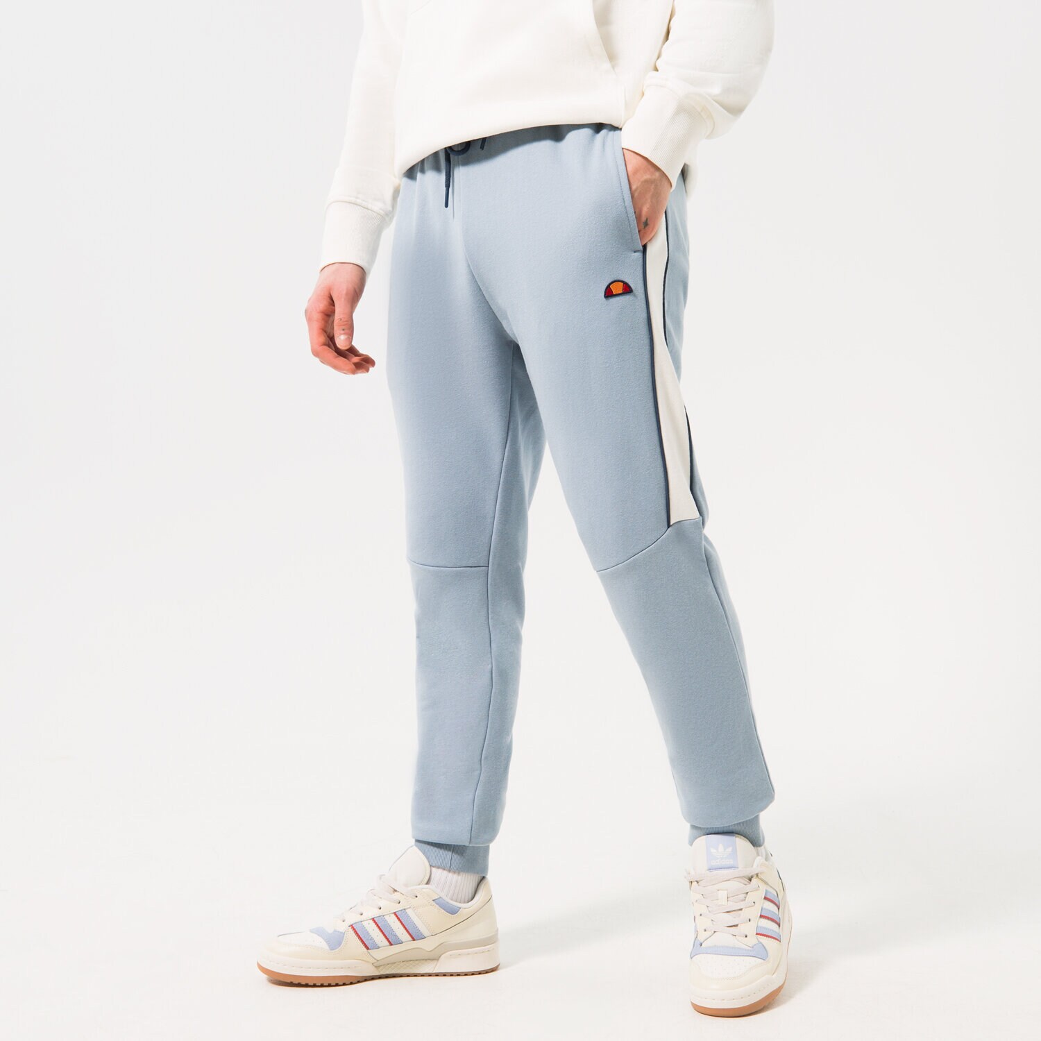Bărbați pantaloni ELLESSE PANTALONI  FERRETI JOG PANT LBLUE SHR17442426 Albastru