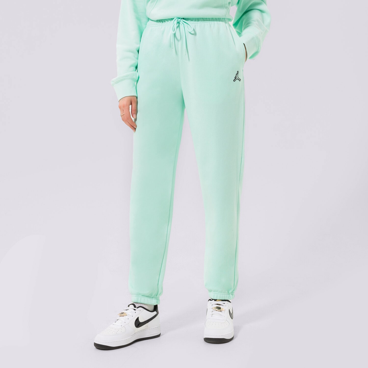 Femei pantaloni JORDAN PANTALONI  ESSENTIAL JOGGERS DN4575-379 verde mentă