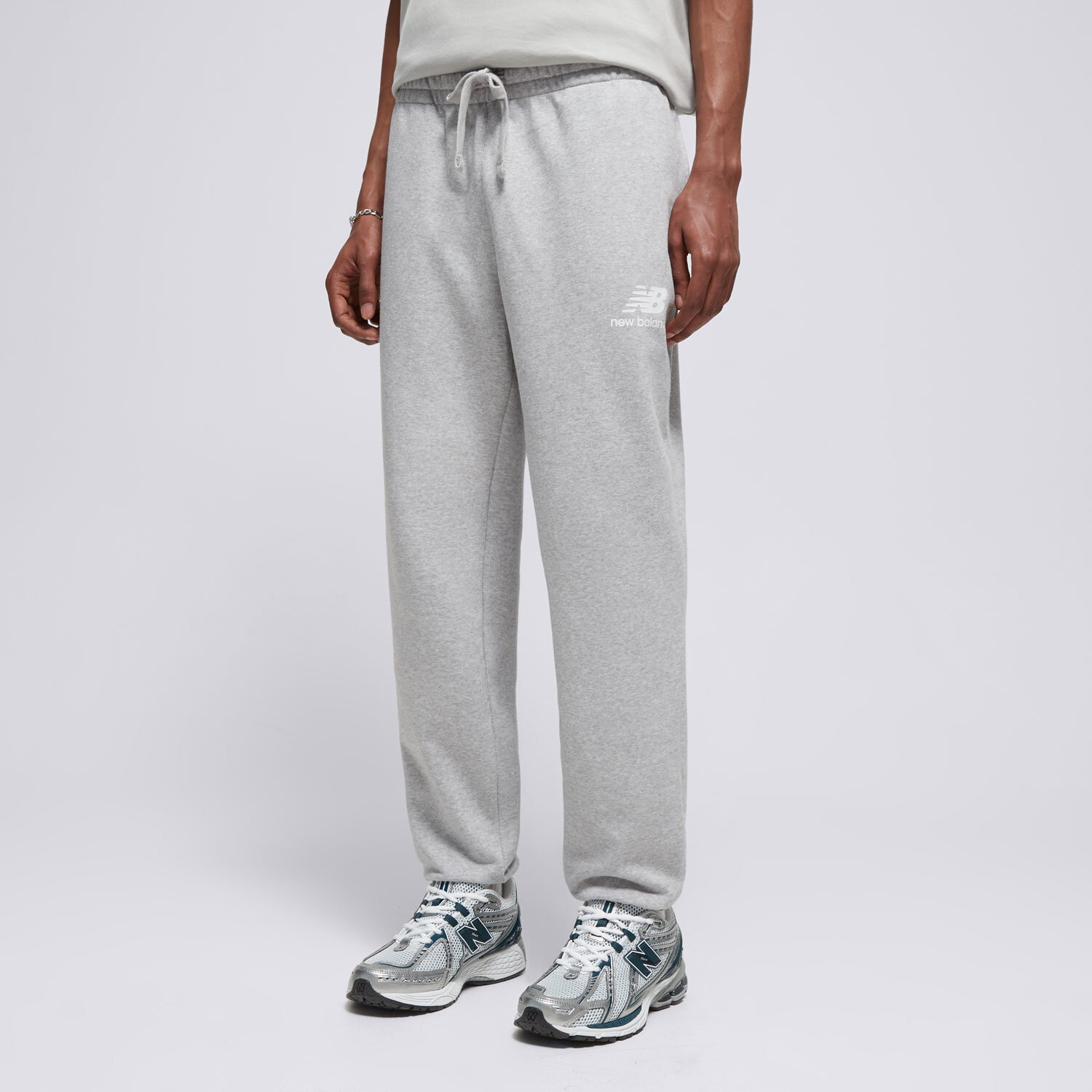 Bărbați pantaloni NEW BALANCE PANTALONI  NB ESSENTIAL STACKED MP31539AG Gri