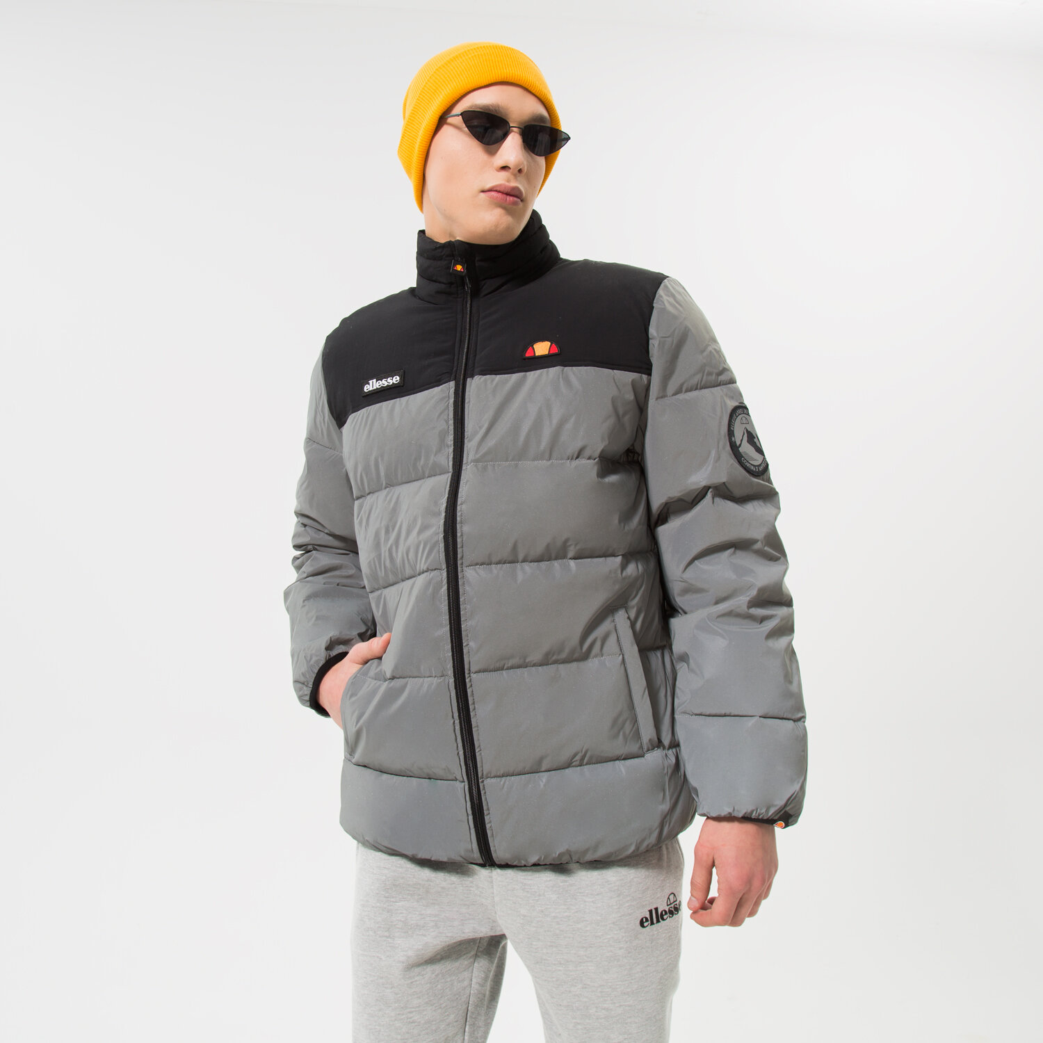 Bărbați eacă de iarnă ELLESSE JACHETĂ CU PUF NEBULA JACKET BLK/RFLCTV SHK12789037 Negru