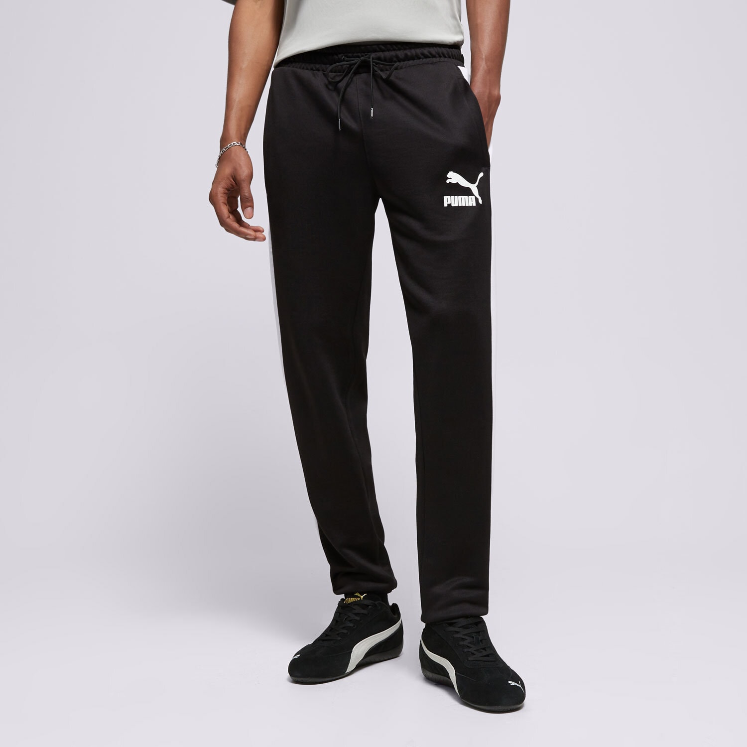 Bărbați pantaloni PUMA PANTALONI  ICONIC T7 TRACK 53009801 Negru