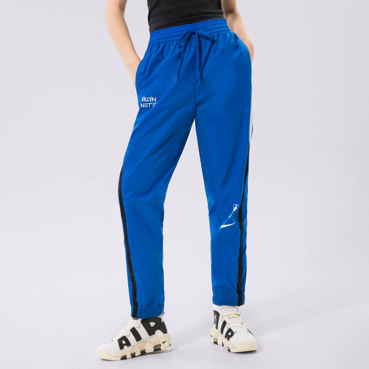 Femei pantaloni NIKE PANTALONI  BKN W NK TRKST PANT CTS CE NBA DO0129-463 Albastru