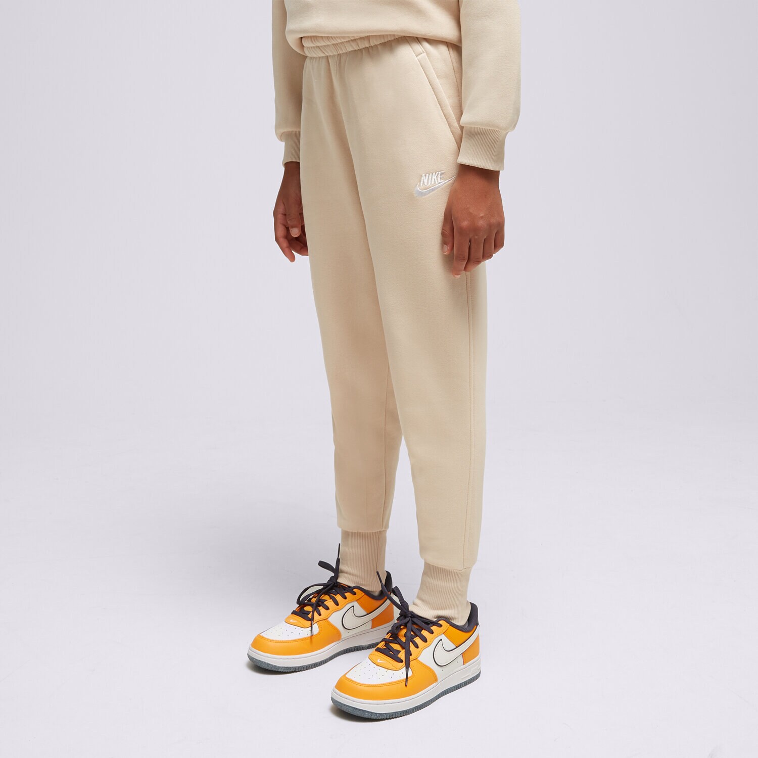 Pantaloni pentru copii NIKE PANTALONI  G NSW CLUB FLC HR FTD GIRL FD2921-126 Bej