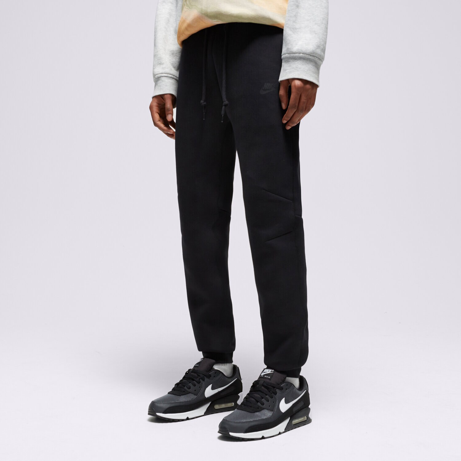 Bărbați pantaloni NIKE PANTALONI  M NK TCH FLC JGGR FB8002-010 Negru