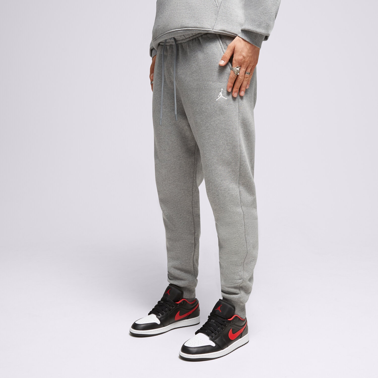 Bărbați pantaloni JORDAN PANTALONI  M J ESS FLC PANT FJ7779-091 Gri