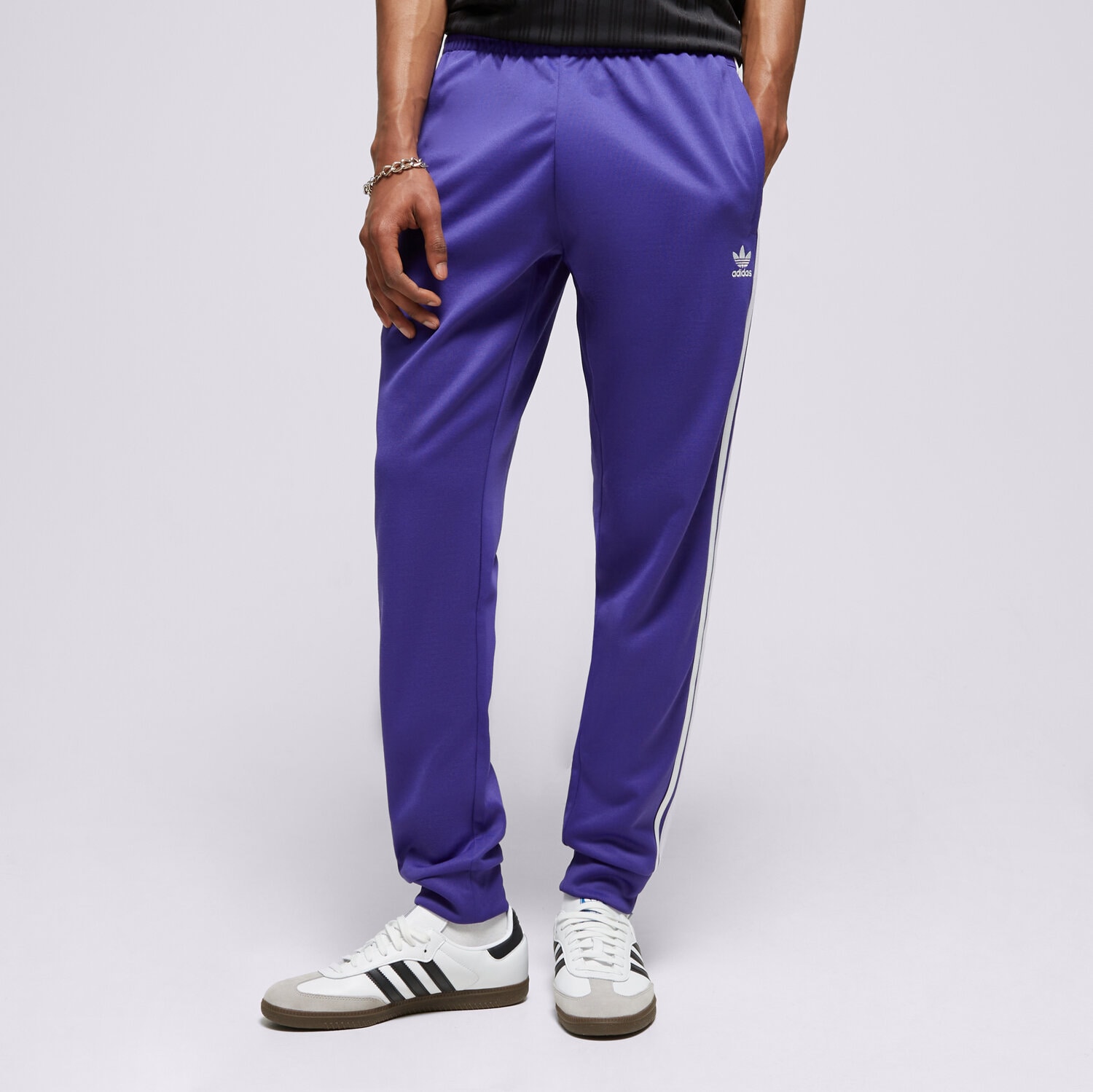 Bărbați pantaloni ADIDAS PANTALONI SST TP IR9877 Violet