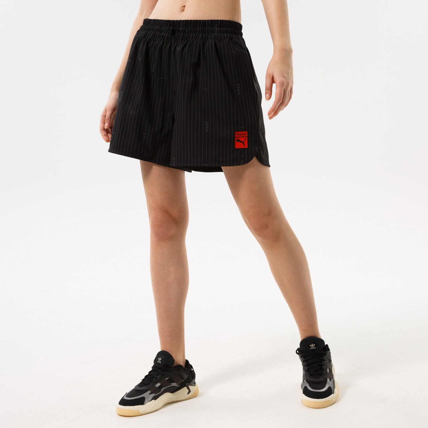 Femei pantaloni scurți PUMA PANTALONI SCURȚI PUMA X VOGUE SHORTS WV 534693-01 Negru