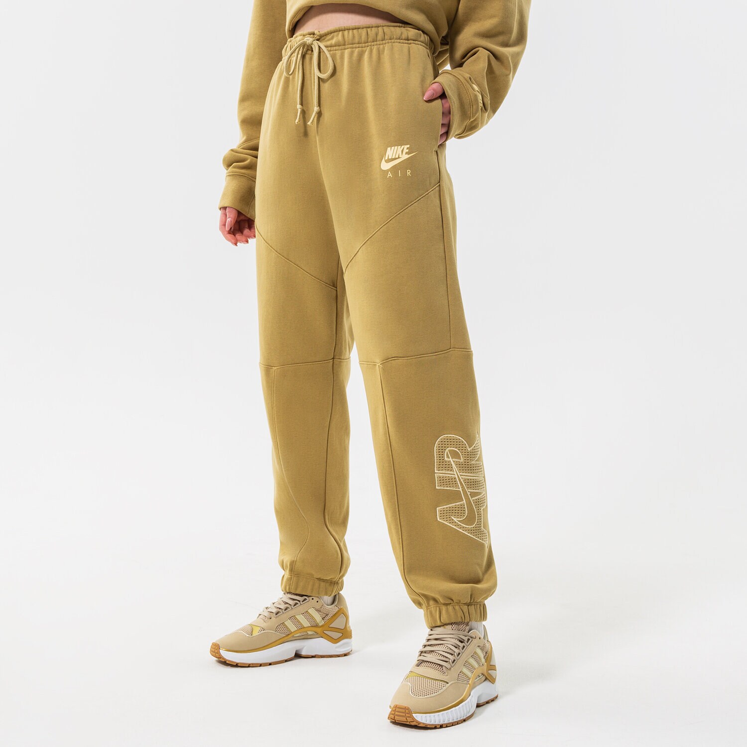 Femei pantaloni NIKE PANTALONI W NSW AIR FLC PANT DM6061-769 Galben Muștar