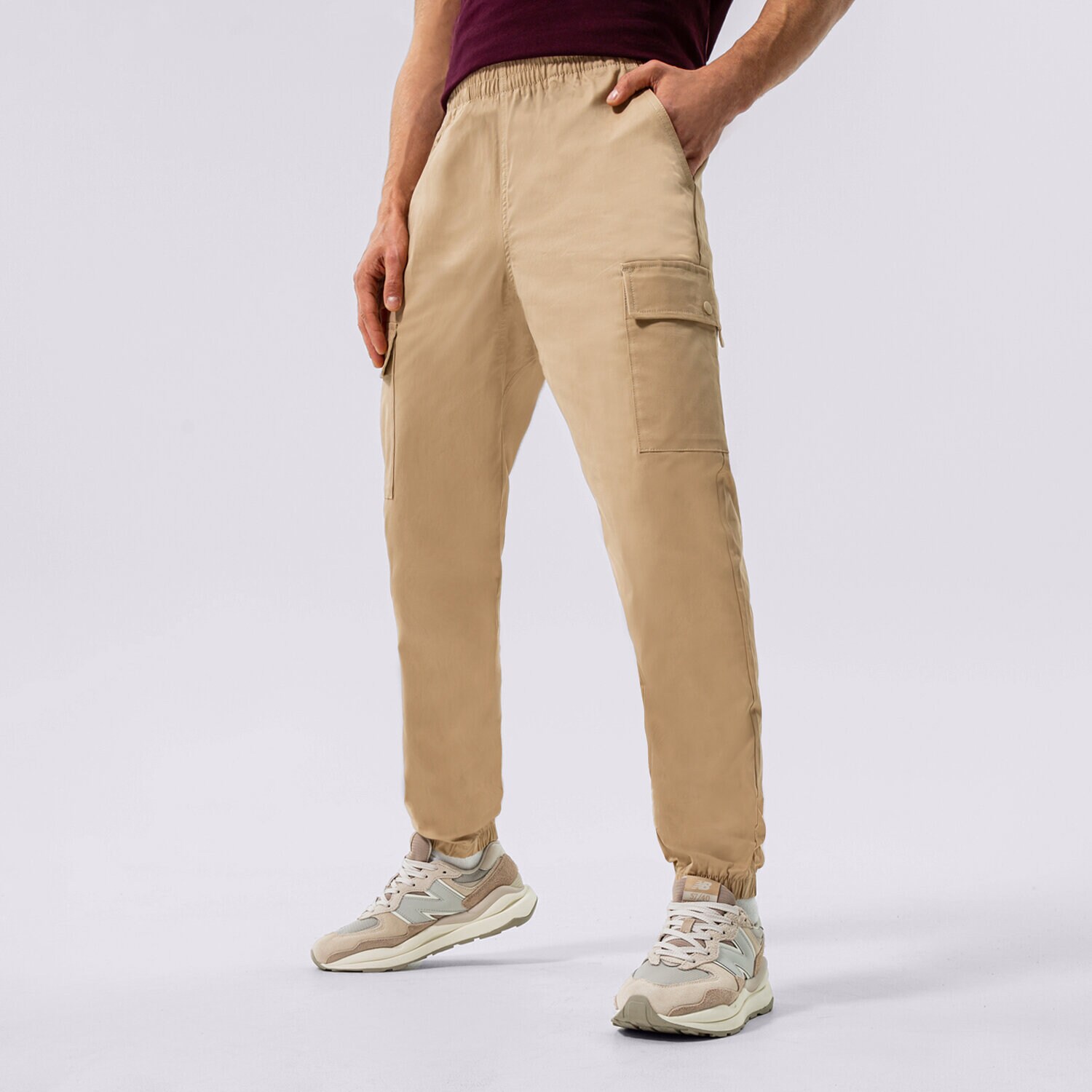 Bărbați pantaloni NEW BALANCE PANTALONI  NB ATHLETICS WOVEN CARGO MP13501INC Bej