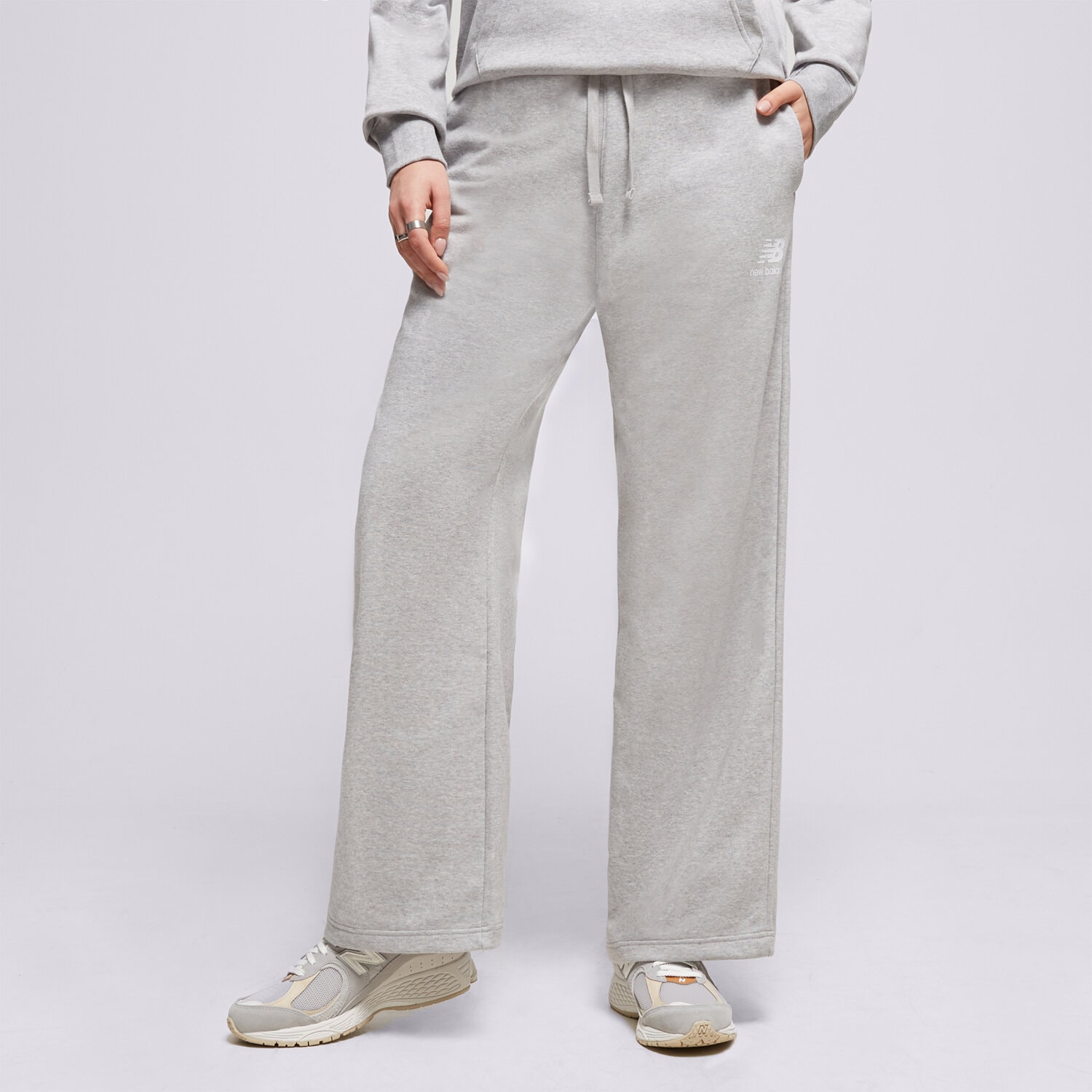 Femei pantaloni NEW BALANCE PANTALONI  NB ESSENTIALS STACKET WP31516AG Gri